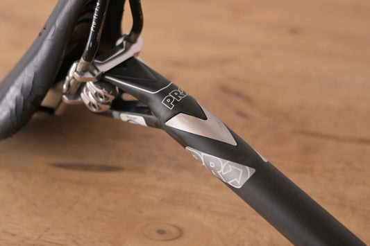 Pro carbon seatpost 27.2/280mm + Prologo saddle